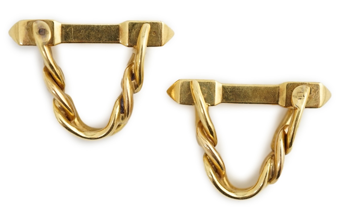 A pair of 18K yellow gold stirrup cufflinks, by Boucheron